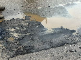 Город накануне встречи главного символа Олимпийских игр 