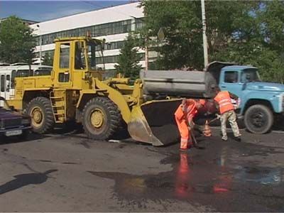 Что это за люди в оранжевых жилетках?