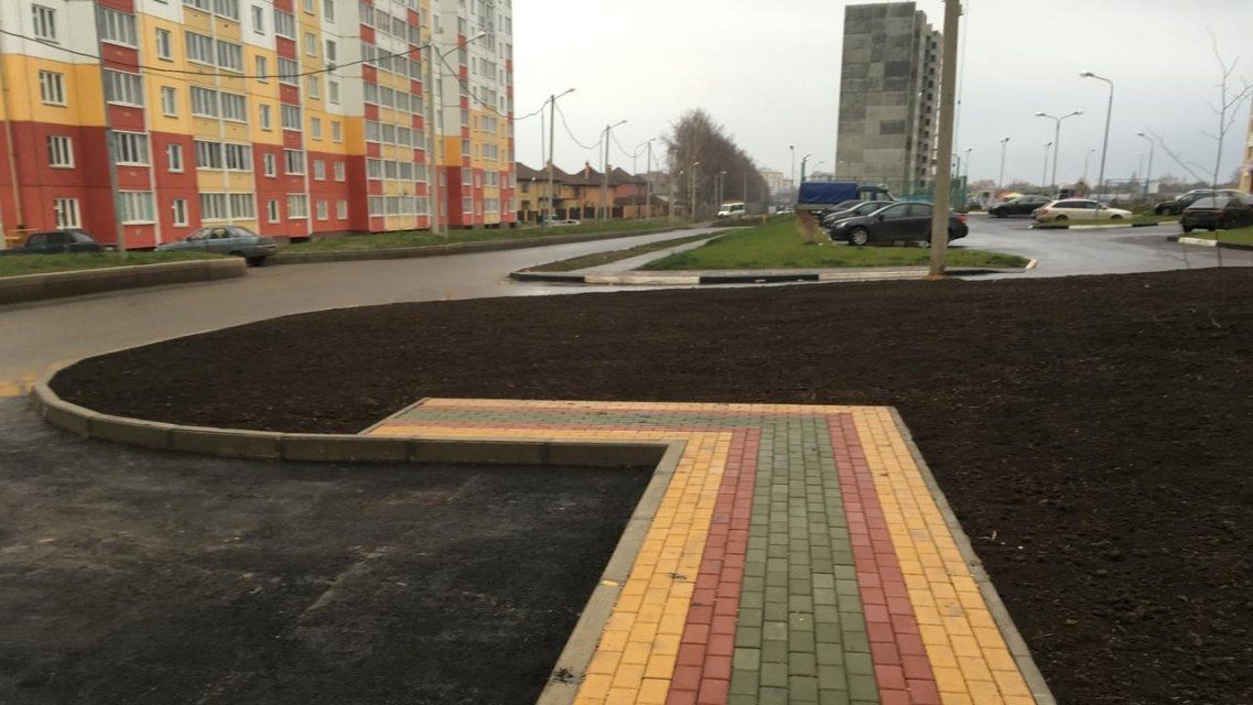 Застройщик доведет до ума тротуары в Болховском микрорайоне
