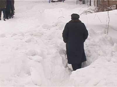 Занесенная снегом деревня