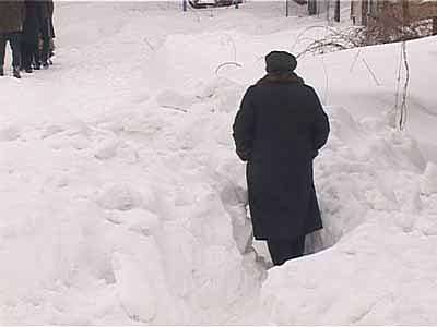 Занесенная снегом деревня